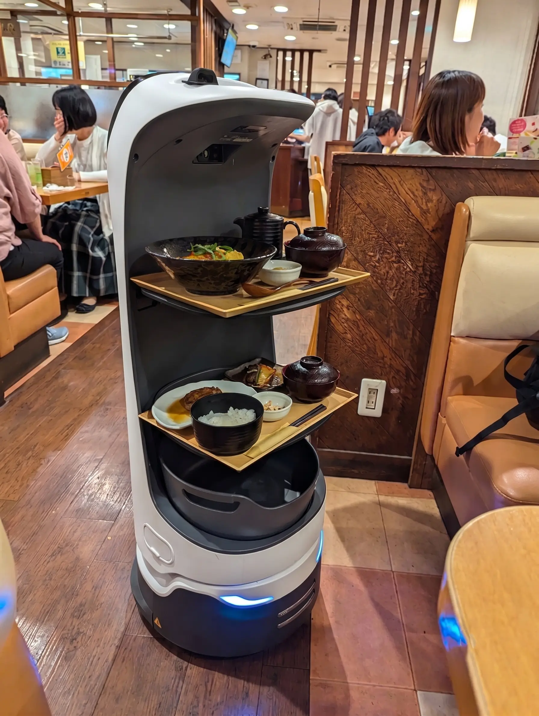 OpenDroids restaurant robot operating in a busy dining room