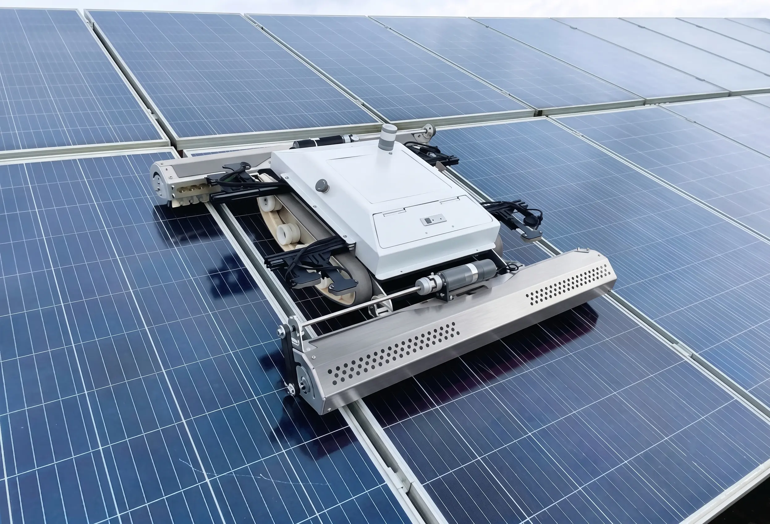 OpenDroids robot on a commercial rooftop solar array